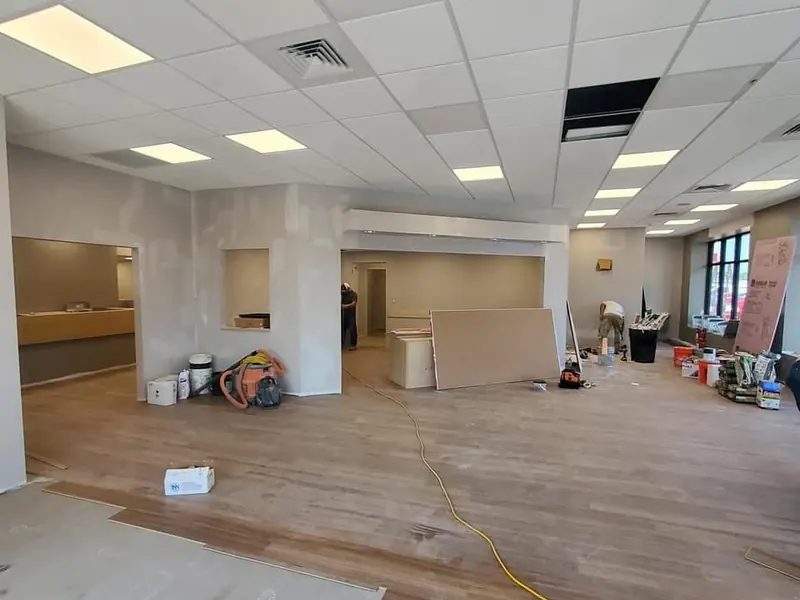 Commercial interior build-out with taped and finished drywall partitions